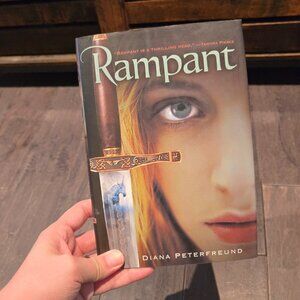 Diana Peterfreund "Rampant" Hardcover Book | Black and Gold